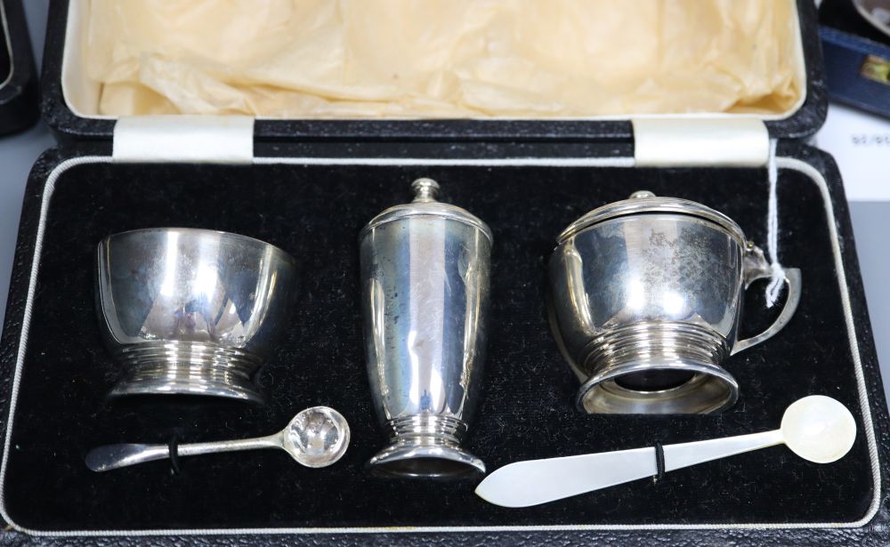 A pair of Continental silver grape scissors, a cased set of six silver cake forks and sundry items